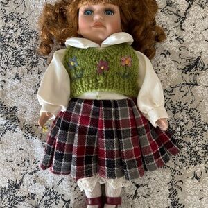 Adorable Doll with Red Hair and Green Floral Vest